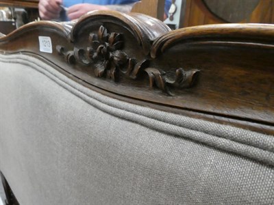 Lot 1213 - A French carved walnut double bed, 160cm by 215cm by 110cm high