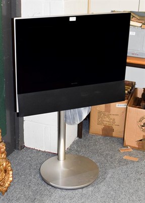 Lot 1232 - A Bang & Olufsen BeoVision television on motorised stand, with remote control, 26'' screen
