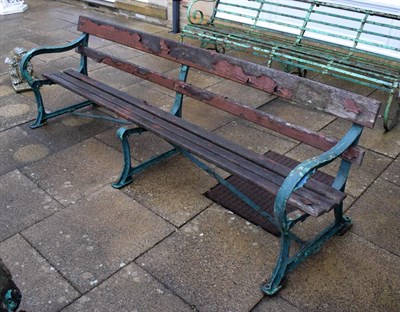 Lot 1238 - A green painted metal bench with wooden slats, Charles Wilkstead Kettering 240cm