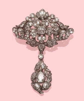 Lot 456 - A Diamond Brooch/Pendant, the old cut cushion, pear and round shaped diamonds set into a floral...