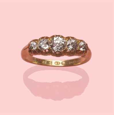 Lot 459 - An 18 Carat Gold Diamond Five Stone Ring, the graduated old cut diamonds in yellow claw settings to