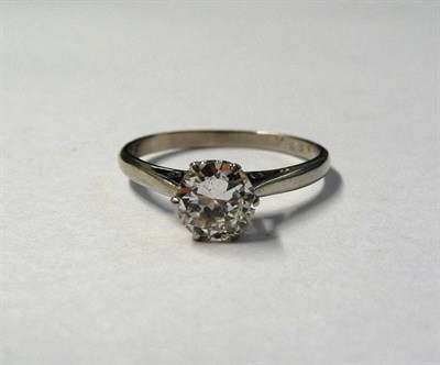 Lot 463 - A Diamond Solitaire Ring, the round brilliant cut diamond in a white six claw setting to a...