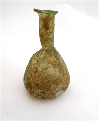 Lot 1 - A Roman Glass Beaker, probably 4th century AD, with slightly everted rim and band of three...