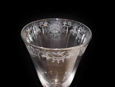 Lot 2 - A Light Baluster Wine Glass, circa 1740, the rounded funnel bowl engraved with a border of...