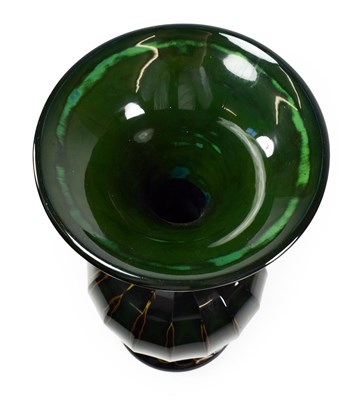 Lot 3 - A Lithyalin Green Glass Vase, mid 18th century, of panelled baluster form with trumpet neck and...