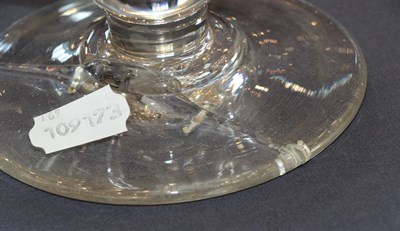 Lot 4 - ~ A Glass Pedestal Bowl, 19th century, of ovoid form with plain stem and circular foot, 25.5cm...