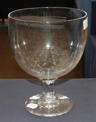 Lot 4 - ~ A Glass Pedestal Bowl, 19th century, of ovoid form with plain stem and circular foot, 25.5cm...