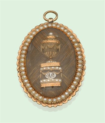 Lot 471 - A Late 18th Century Mourning Pendant, of marquise form, an urn motif decorated with hair and...