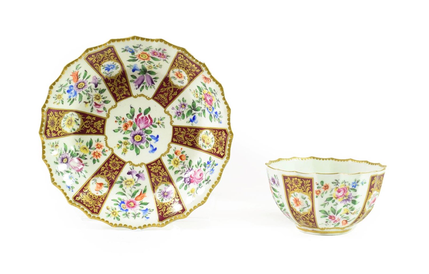 Lot 12 - A Worcester Porcelain Tea Bowl and Saucer, the porcelain circa 1770, the decoration later, of...