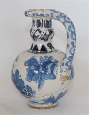 Lot 14 - A Dated English Delft Puzzle Jug, London or Brislington, 1670, of ovoid form, the knopped...