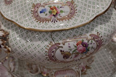 Lot 21 - ^ A Minton Porcelain Dinner Service, circa 1840, painted with flowersprays within gilt scroll...