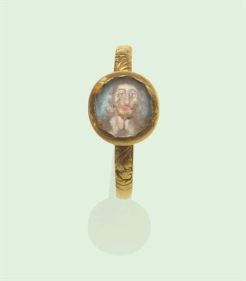 Lot 473 - A Stuart Mourning Ring, depicting a portrait of King Charles I, beneath a faceted rock crystal,...