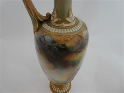 Lot 35 - ^ A Royal Worcester Porcelain Ewer, by Charles White, 1907, of baluster form with leaf sheathed...