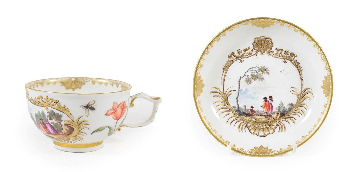 Lot 48 - A Meissen Porcelain Teacup and Saucer, circa 1740, painted with figures in landscape within...
