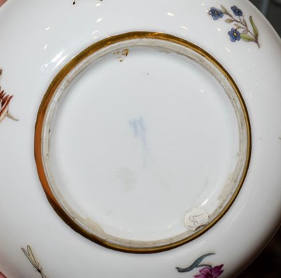 Lot 48 - A Meissen Porcelain Teacup and Saucer, circa 1740, painted with figures in landscape within...