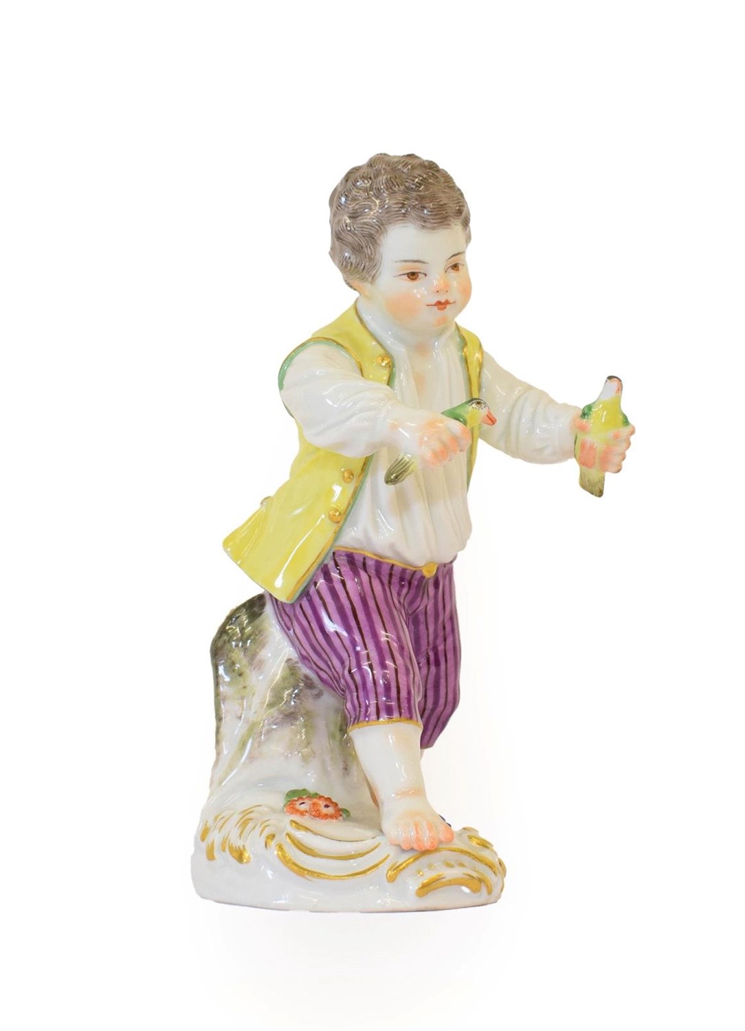 Lot 51 - A Meissen Porcelain Figure of a Boy, late 19th/early 20th century, wearing 18th century costume...