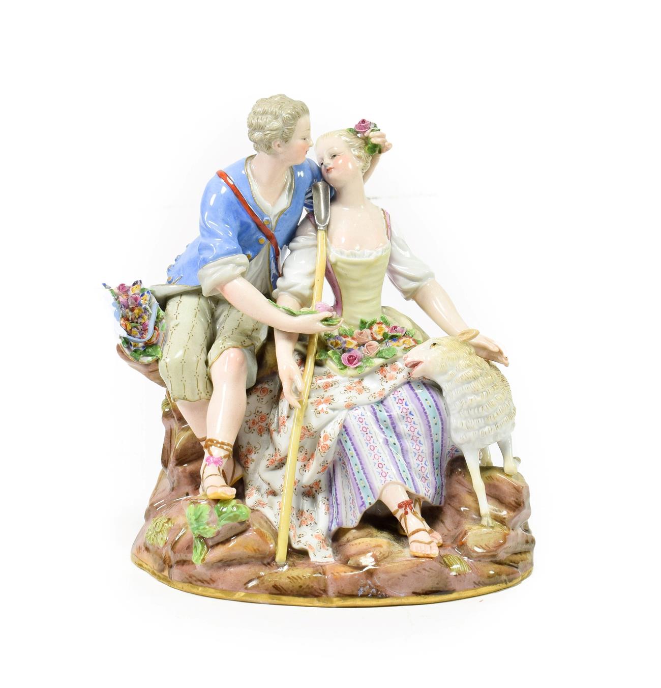Lot 52 - A Meissen Porcelain Figure Group, circa 1880, as a 18th century lovers sitting on a rocky...