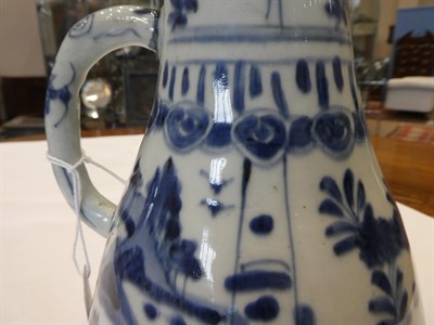 Lot 68 - A Kraak Porcelain Ewer, early 17th century, of pear shape with loop handle, typically painted...