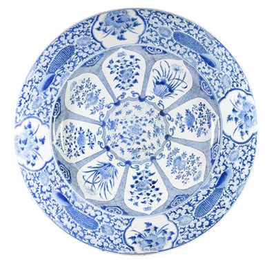 Lot 69 - A Chinese Porcelain Large Circular Dish, Kangxi, painted in underglaze blue with a foliate...