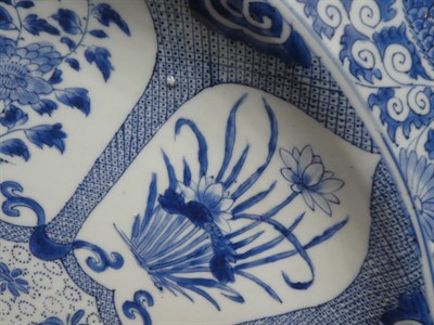Lot 69 - A Chinese Porcelain Large Circular Dish, Kangxi, painted in underglaze blue with a foliate...