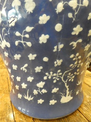 Lot 71 - A Chinese Porcelain Baluster Jar and Cover, 18th century, decorated in relief with birds...