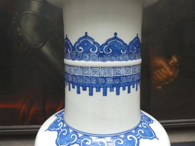 Lot 73 - A Chinese Porcelain Rouleau Vase, Kangxi, painted in underglaze blue with a musician kneeling...