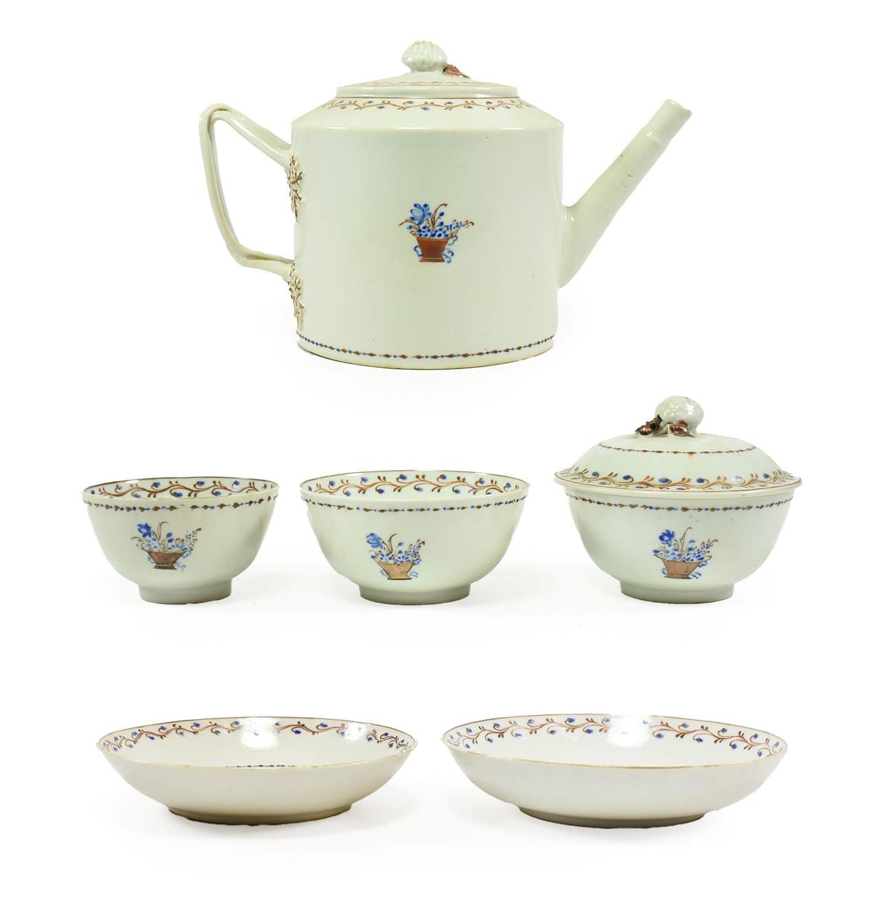 Lot 84 - A Chinese Porcelain Tea Service, circa 1790, painted with a basket of flowers within a floral...