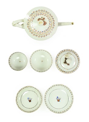 Lot 84 - A Chinese Porcelain Tea Service, circa 1790, painted with a basket of flowers within a floral...
