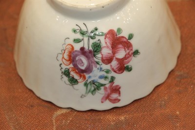 Lot 88 - ~ A Chinese Porcelain Tea Bowl and Two Saucers, Qianlong, painted in famille rose enamels with...