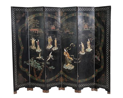Lot 104 - ^ A Chinese Lacquer Six-Fold Screen, late 19th/early 20th century, inlaid in ivory and...