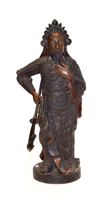 Lot 105 - A Chinese Bronze Figure of a Guardian, 19th century, standing wearing scroll headdress and...