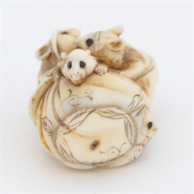 Lot 108 - A Japanese Ivory Netsuke, Meiji period, as a seated animal with a large stomach, signed, 4cm...