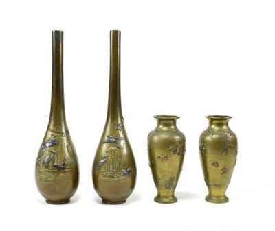 Lot 109 - A Pair of Japanese Mixed Metal Vases, Meiji period, of slender baluster form, depicting cranes...