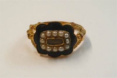 Lot 483 - A William IV Mourning Ring, a scalloped centre of a locket panel enclosing hair within a border...