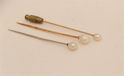 Lot 152 - ~ A Pearl and Diamond Stickpin, the pearl with a rose cut diamond collar in white millegrain...