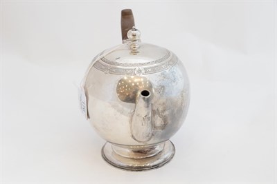 Lot 176 - ~ A George V Silver Teapot, by Sebastian Garrard, London, 1921, bullet-shaped, the rim engraved...