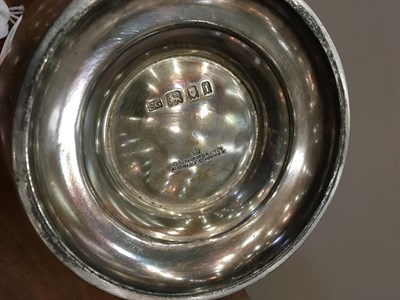 Lot 176 - ~ A George V Silver Teapot, by Sebastian Garrard, London, 1921, bullet-shaped, the rim engraved...