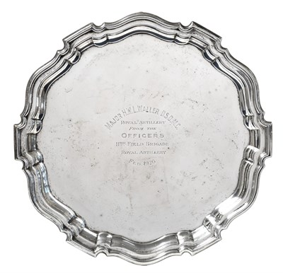 Lot 179 - ~ A George V Silver Salver, by Mappin and Webb, Sheffield, 1924, shaped circular and on three...