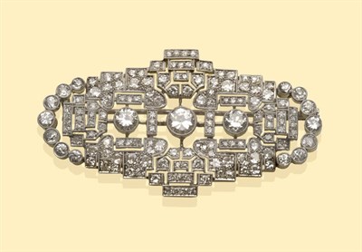 Lot 490 - An Art Deco Diamond Brooch, three principal round brilliant cut diamonds within a pierced geometric