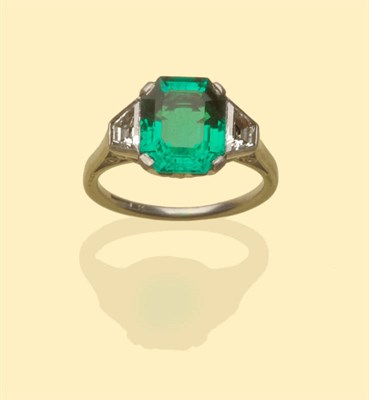 Lot 491 - An Exceptional Art Deco Emerald and Diamond Ring, the very fine step cut emerald with truncated...