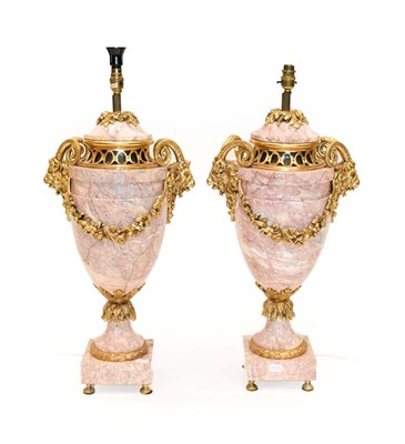 Lot 252 - {} A Pair of Gilt Metal Mounted Pink Veined Marble Lamp Bases, in Neo-Classical style, of urn,...