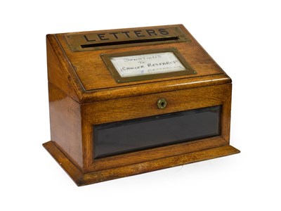 Lot 260 - ~ A Brass Mounted Oak Country House Letter Box, of rectangular form, the hinged sloping top set...