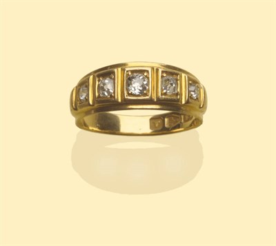 Lot 496 - An 18 Carat Gold Diamond Five Stone Ring, five graduated old cut diamonds, in yellow claws,...