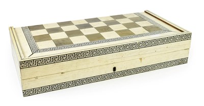Lot 261 - ~ A Vizagapatam Stained and Natural Ivory and Parquetry Games Box, mid 19th century, of hinged...