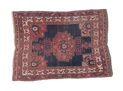 Lot 297 - Afshar Rug South East Iran, circa 1900 The plain midnight blue field centred by a terracotta...