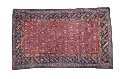 Lot 298 - Hamadan Rug West Iran, circa 1920 The brick red field of boteh enclosed by charcoal borders of...