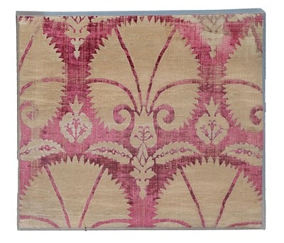 Lot 316 - An Ottoman Silk Velvet Ã‡atma Panel Bursa or Istanbul, 17th century, on a faded crimson ground with