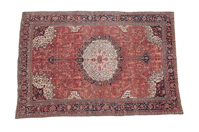 Lot 329 - Feraghan Saroukh Carpet West Iran, circa 1920 The terracotta field of angular vines around a...