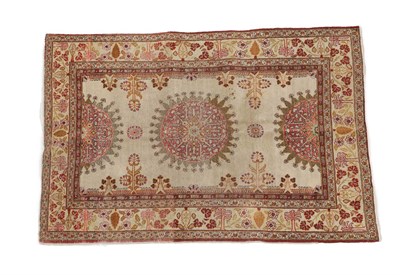 Lot 331 - Haji Jallili Tabriz Rug North West Iran, late 19th century The cream field with a roundel medallion