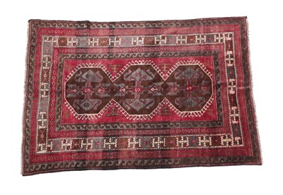 Lot 332 - Kars Rug North East Anatolia, circa 1920 The raspberry field with a latch hook panel of...